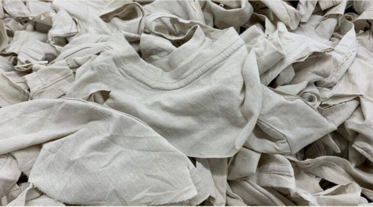 bundle of t shirts in a pile