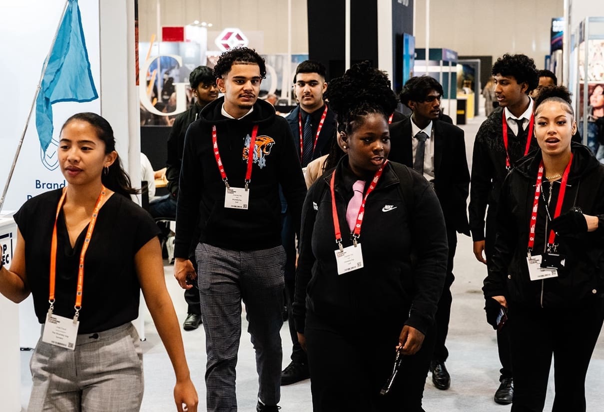 group of young students walk the halls of BLE